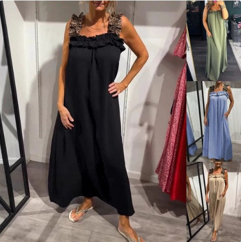 Cepli, kolsuz, rahat kadın elbisesi