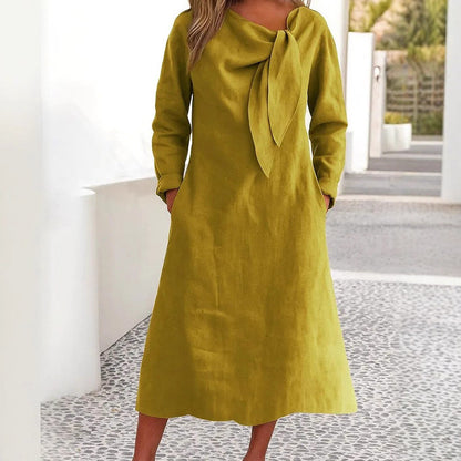 Uzun kollu ve yuvarlak yakalı düz elbise