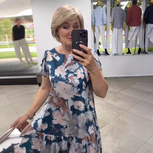 Kısa kollu, yuvarlak yakalı, çiçek desenli, bol elbise