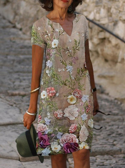 V yakalı baskılı elbise