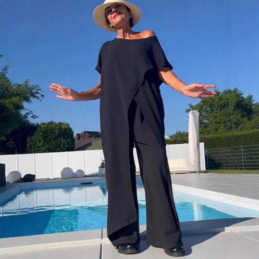 Düz renk omuzları açık üst ve pantolon takımı