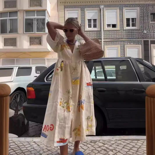 Pamuk ve ketenden yapılmış, baskılı, kısa kollu, V yakalı kadın elbisesi