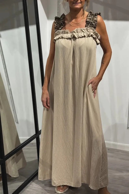 Cepli, kolsuz, rahat kadın elbisesi